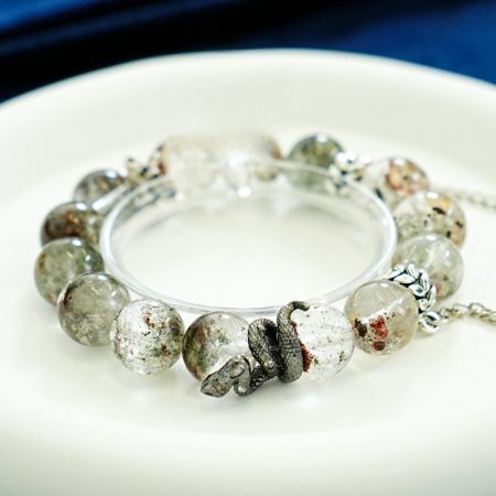 Serpent’s Embrace: Guardian Green Crystal Bracelet of Wisdom & Protection